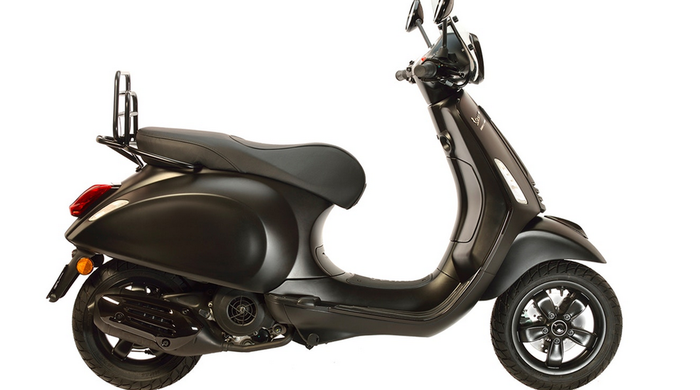 In Paris, Saint Laurent for Colette with the Vespa
